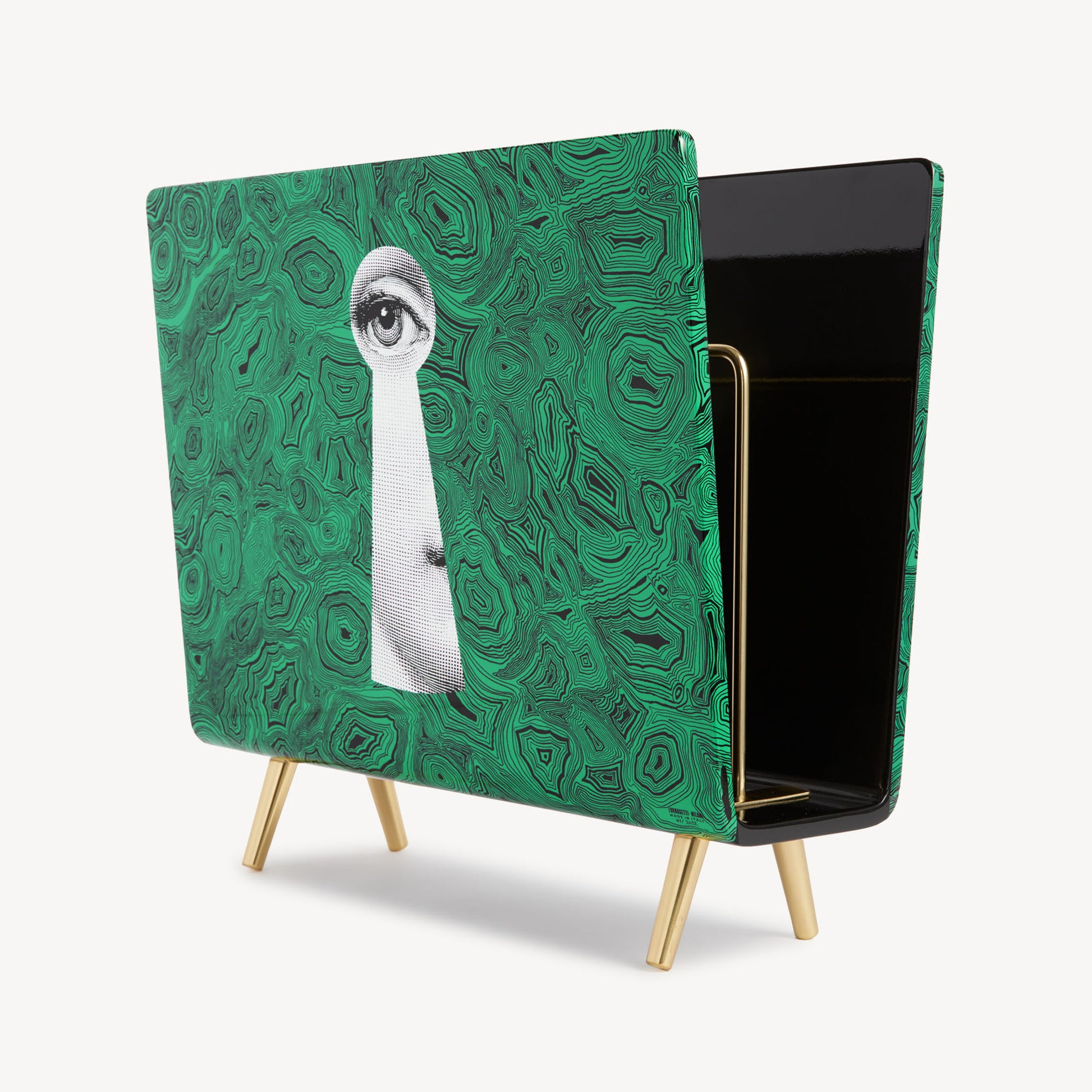 Angled view of magazine rack Serratura su Malachite with open back revealing interior; green patterned exterior, gold legs