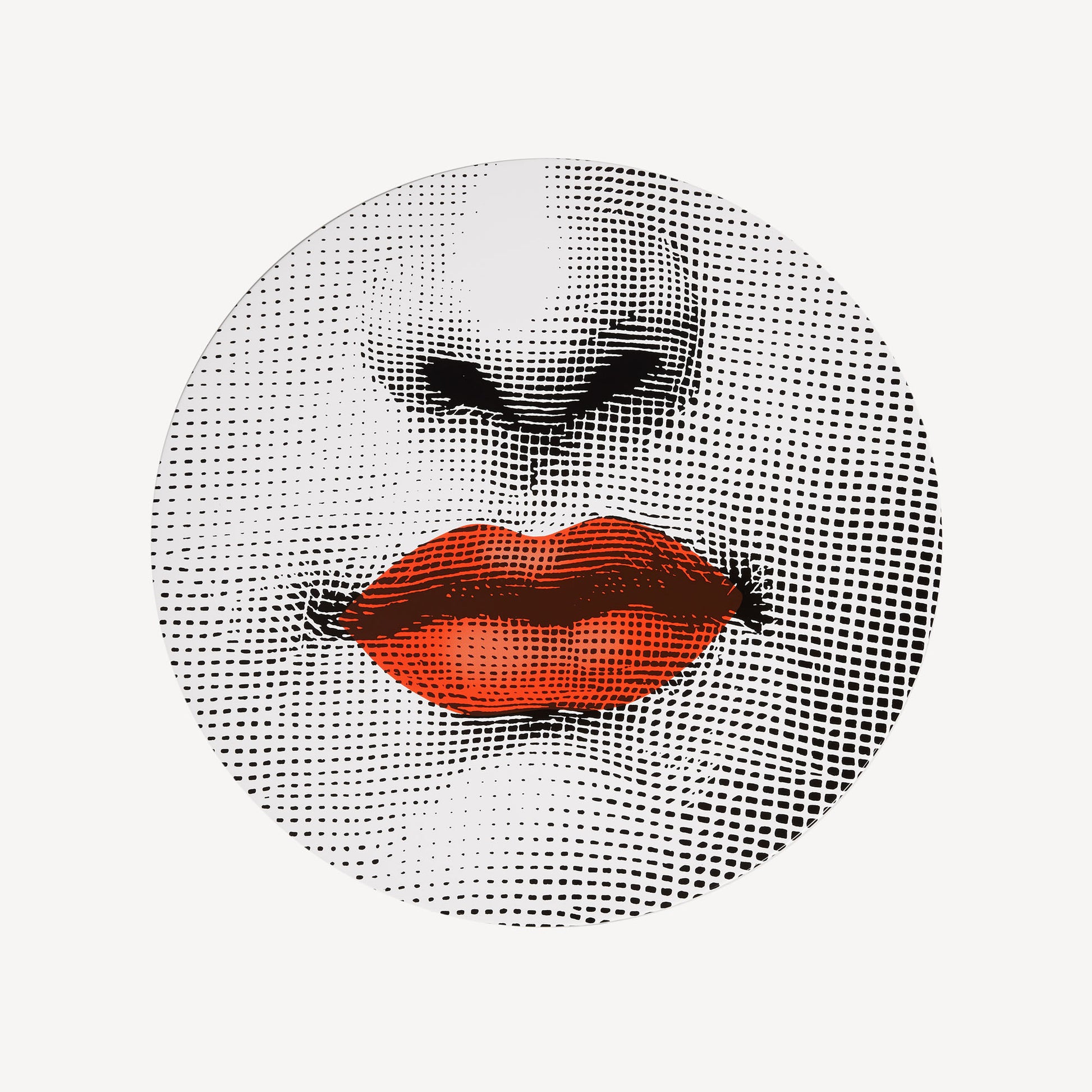 Close-up showing other half of lips on round table surface
