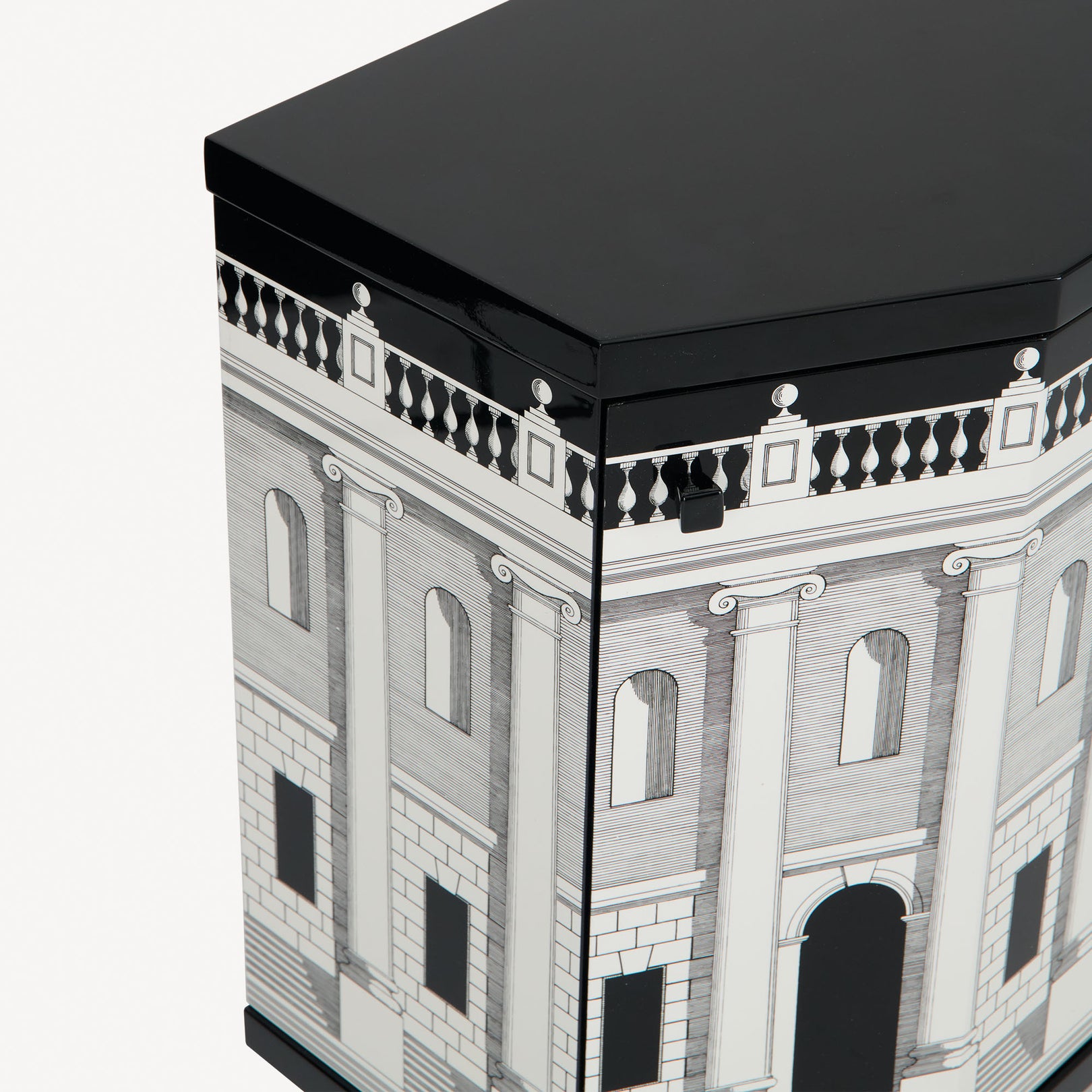 Front-left angle view of a black and white rectangular cabinet with architectural print
